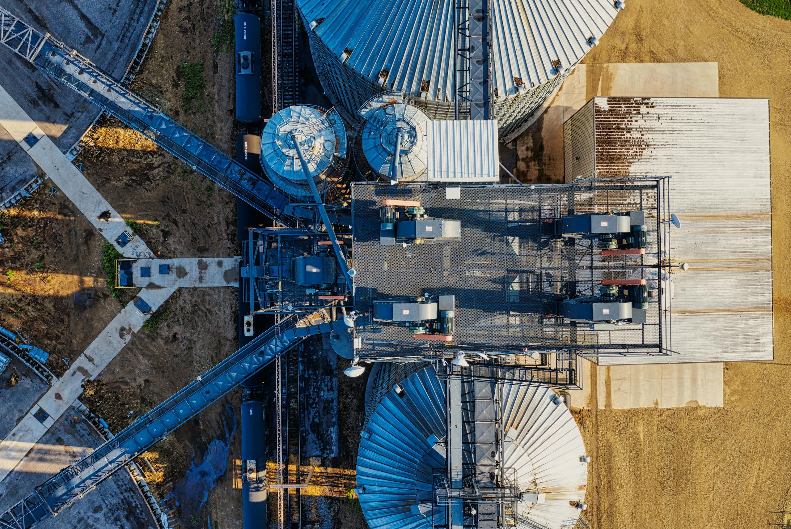 High-angle shot of grain silos and structures at an industrial site in Randolph, MN.